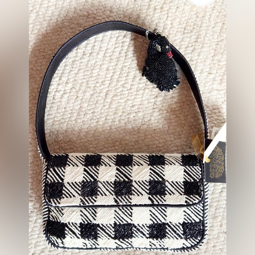 from India to YOU! Hand beaded houndstooth shoulder bag with black swan charm.